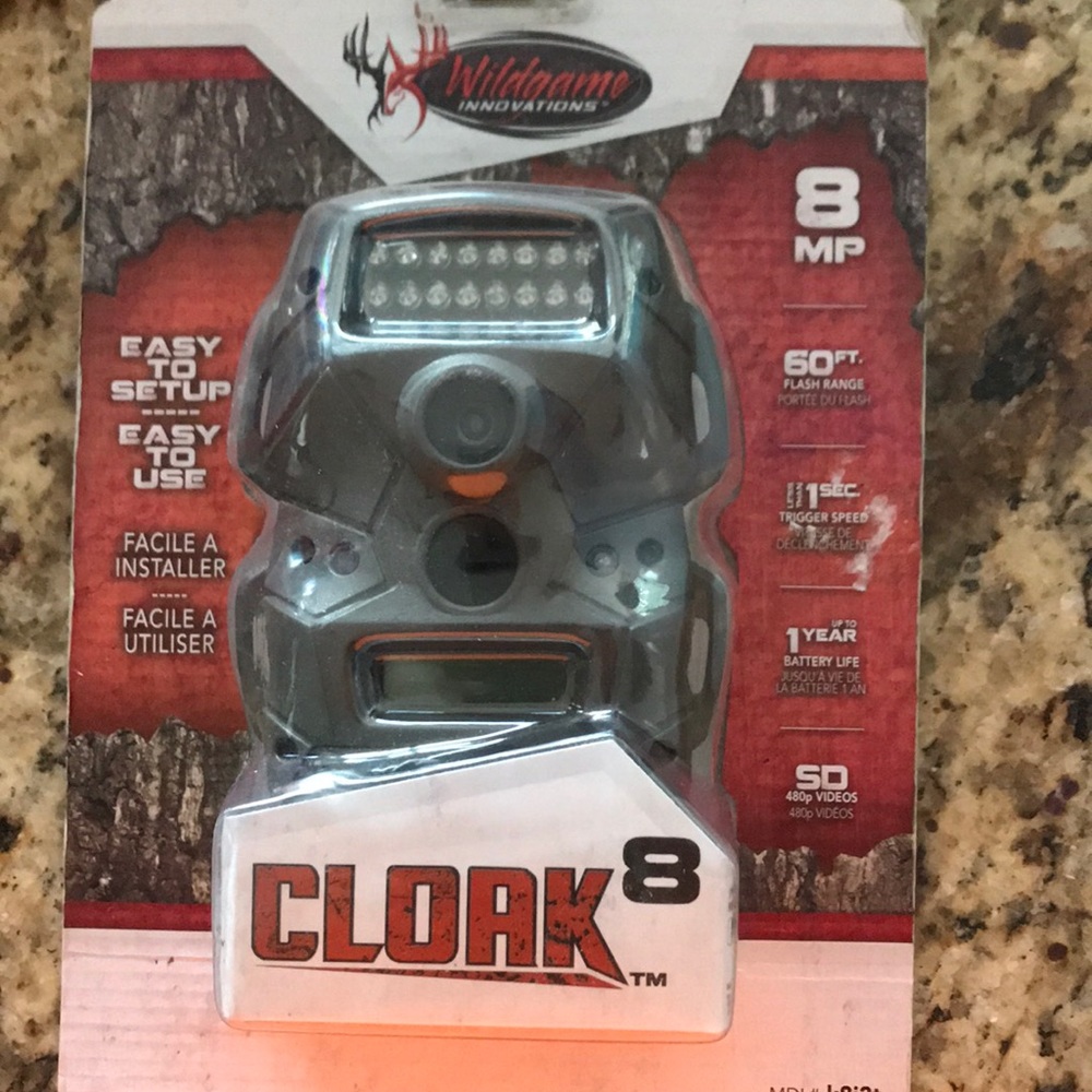 Cloak 8 trail/security camera.  NEVER OPENED